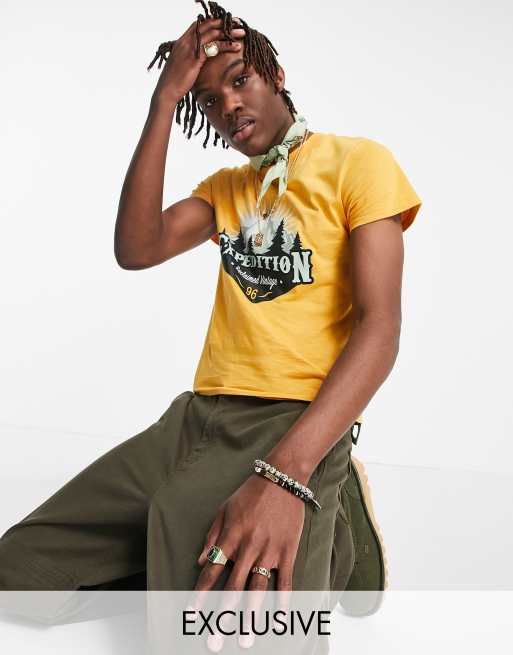 Reclaimed Vintage Inspired - T-shirt rétro arancione con grafica outdoors 