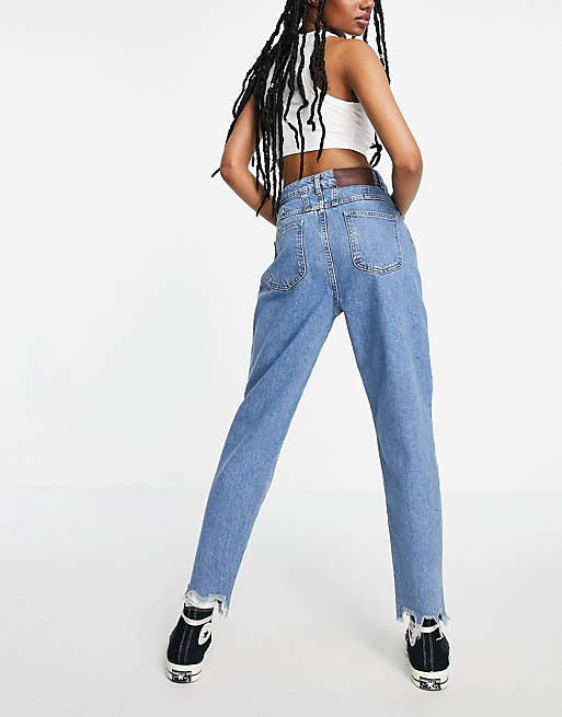 Women Reclaimed Vintage inspired the 89' slim tapered jean with destroyed hems in blue 