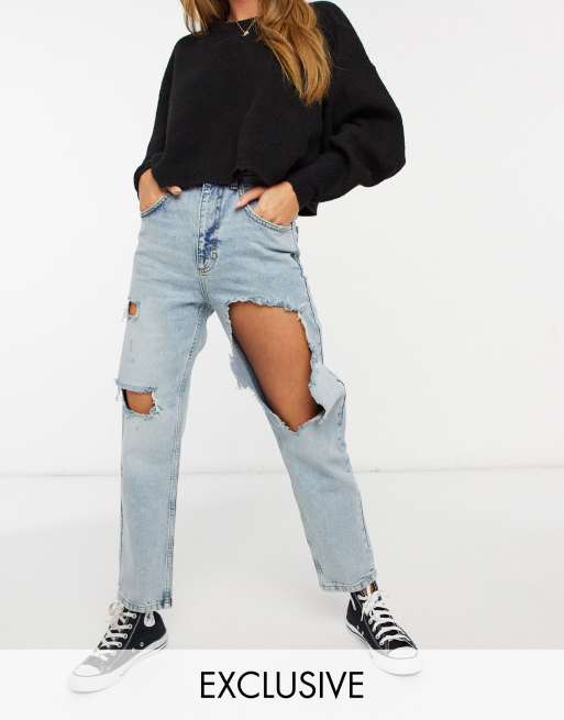 Jeans con strappi top