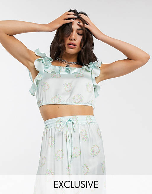 Exclusives Reclaimed Vintage inspired top with ruffle blue floral print 