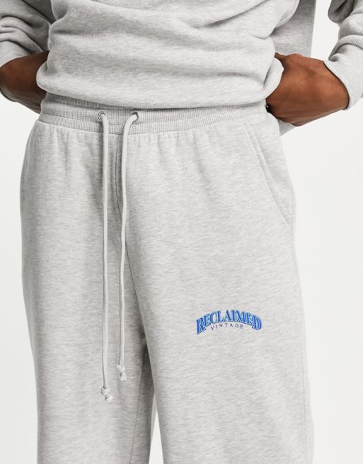 Reclaimed Vintage inspired unisex baggy dad joggers with contrast logo in  grey marl co-ord