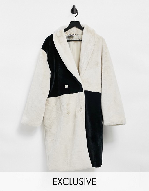 Reclaimed Vintage inspired unisex fur coat in black and cream patchwork