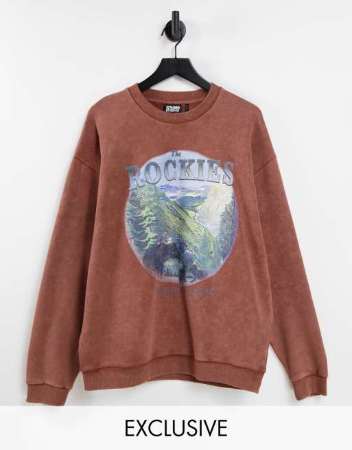 Reclaimed Vintage inspired unisex oversized sweatshirt with rockies print  in brown | ASOS