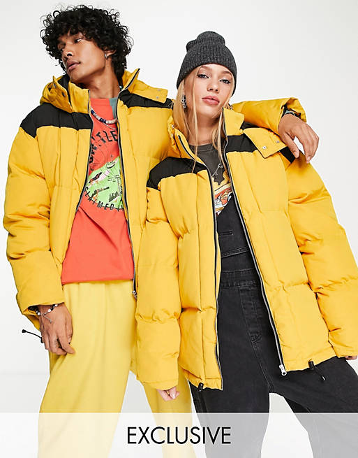 Women Reclaimed Vintage inspired unisex puffer jacket in yellow and black 