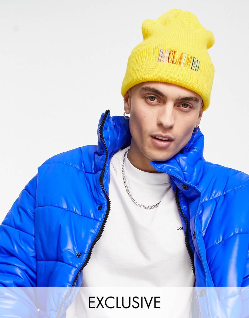 Reclaimed Vintage inspired unisex rainbow logo beanie in mustard