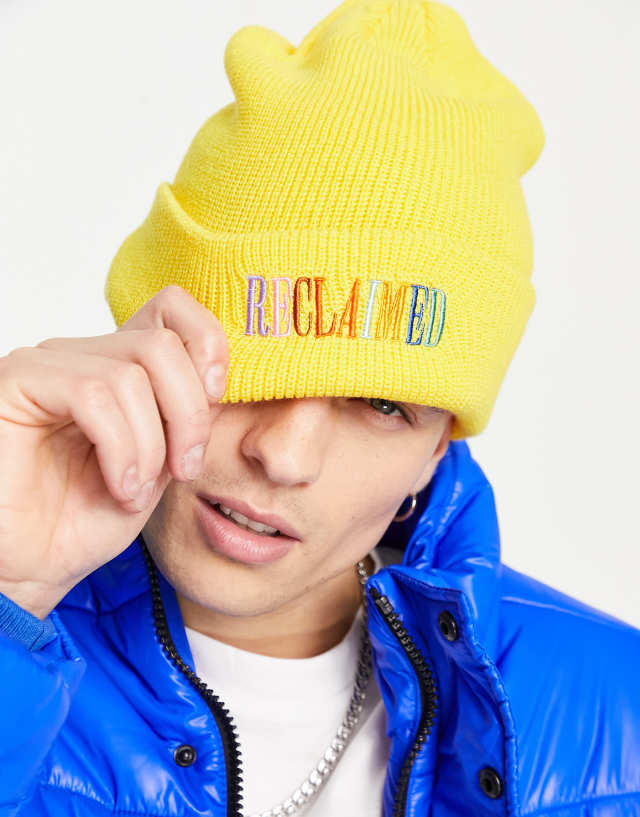 Reclaimed Vintage inspired unisex rainbow logo beanie in mustard 2