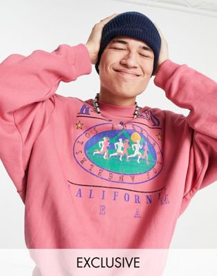 Reclaimed Vintage inspired unisex sweatshirt with running graphic in washed  pink ASOS
