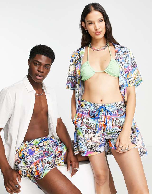 Reclaimed Vintage inspired unisex swimshort in holiday postcard print
