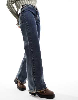 Reclaimed Vintage - Jean baggy style années 2000 - Délavage bleu foncé effet sali | ASOS