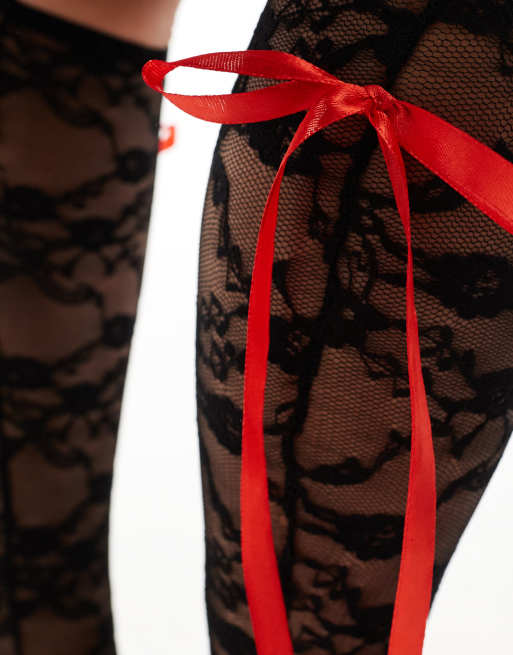 Black knee high socks with red bows deals