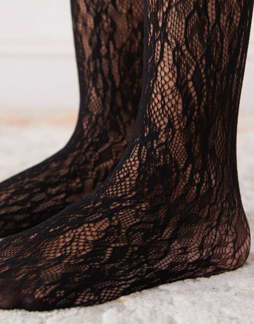 Reclaimed Vintage knee length lace socks with ruffles in black
