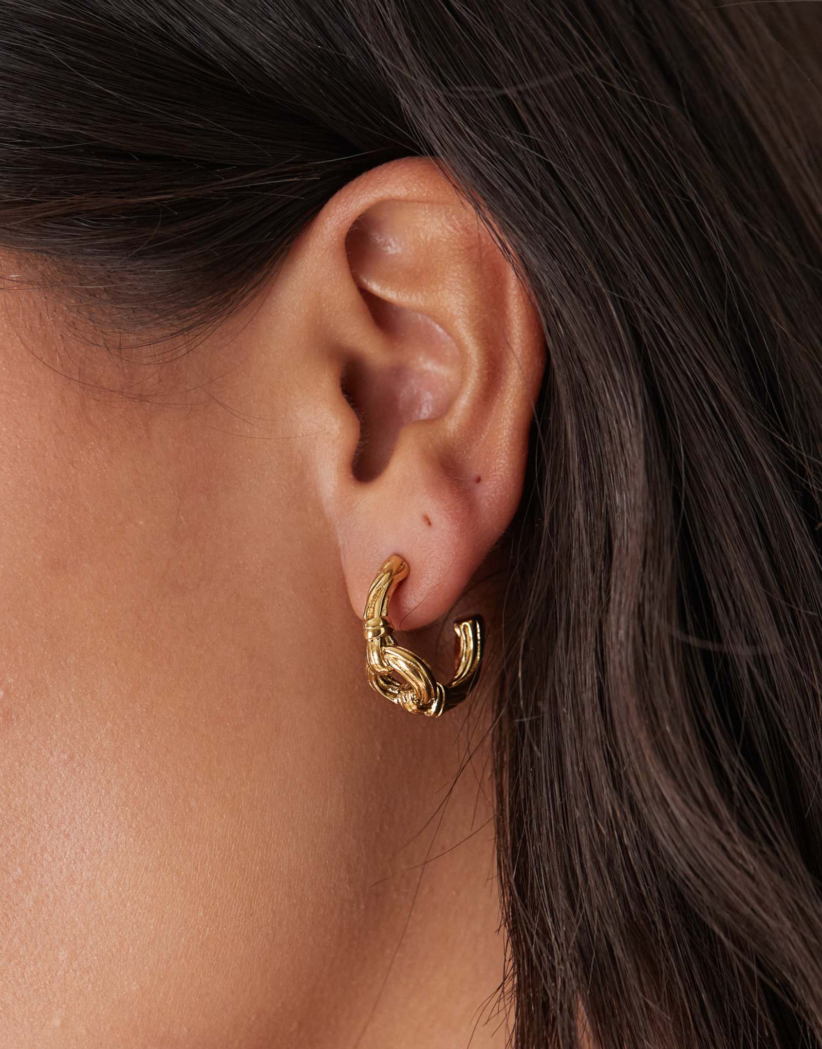 Восстановленные старинные серьги-кольца с узлами из золота