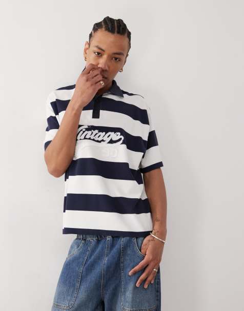 Reclaimed Vintage stripe pique polo shirt with graphic in navy