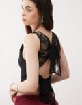 [Reclaimed Vintage] Reclaimed Vintage lace slash neck top with tie back in black M BLACK