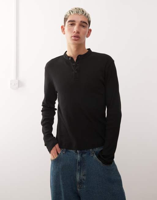 Reclaimed Vintage – Langärmliges Muskelshirt aus geripptem Jersey in Schwarz mit Henley-Ausschnitt 