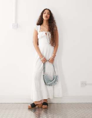 Reclaimed Vintage - Lange western zomerjurk met lagen van broderie en gestrikte voorkant in wit