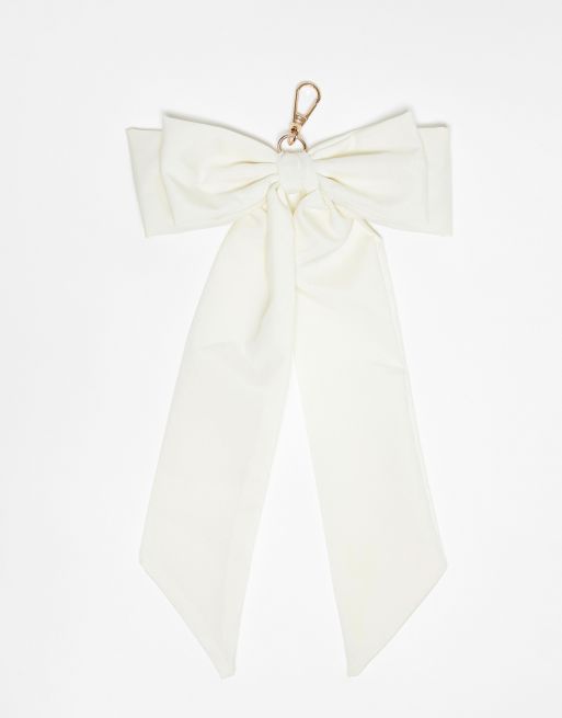 Reclaimed Vintage large bow bag charm in cream 