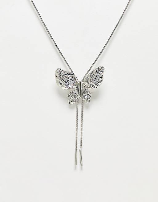 Reclaimed Vintage laryiat necklace with butterfly pendant in silver