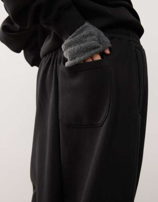 Reclaimed Vintage – Lässig geschnittene Jogginghose in Schwarz mit Unisex-Schnitt , 4 von 4