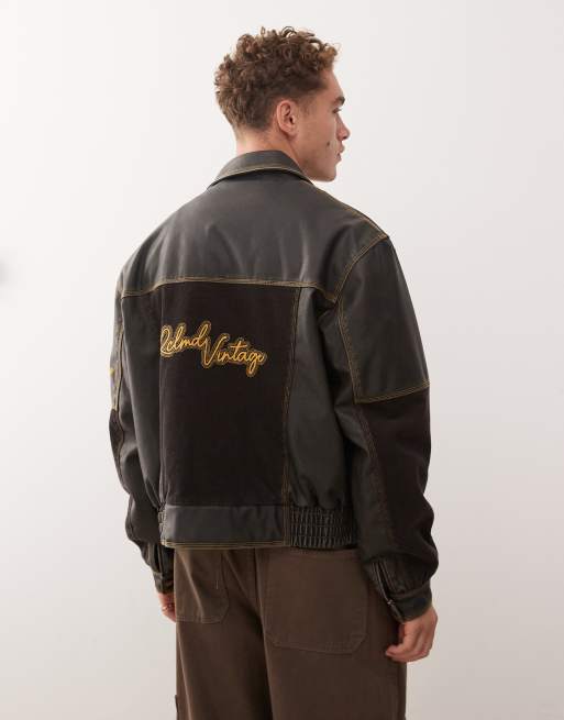 Reclaimed Vintage leather look bomber jacket with contrast corduroy panels in black