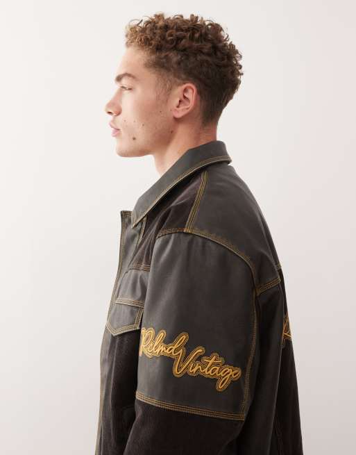 Reclaimed Vintage leather look bomber jacket with contrast corduroy panels in black