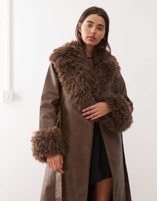 Reclaimed Vintage leather look trench coat with faux fur collar and cuffs in brown