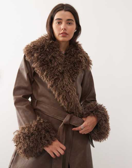 Reclaimed Vintage leather look trench coat with faux fur collar and cuffs in brown