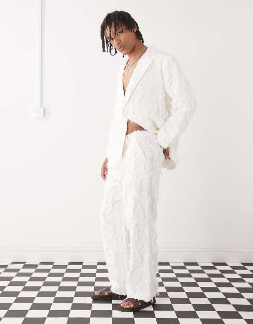 Reclaimed Vintage – Limited Edition – Elegante Hose in Creme mit Ausfransungen