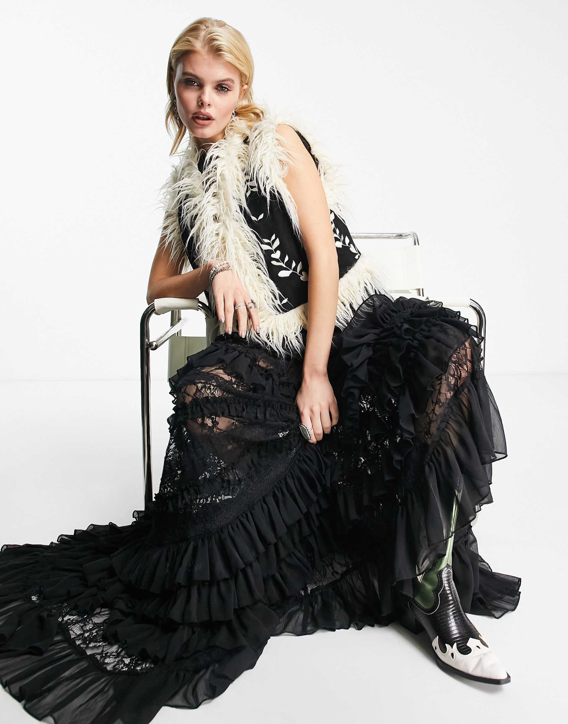 Reclaimed Vintage limited edition embroidered faux fur gilet in black