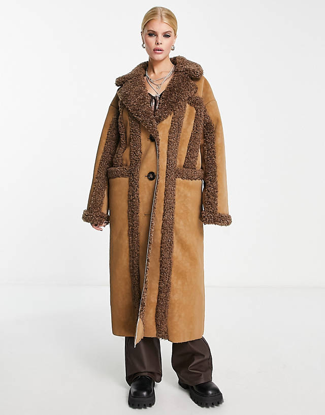 Reclaimed Vintage - limited edition longline shearling coat in tan and brown