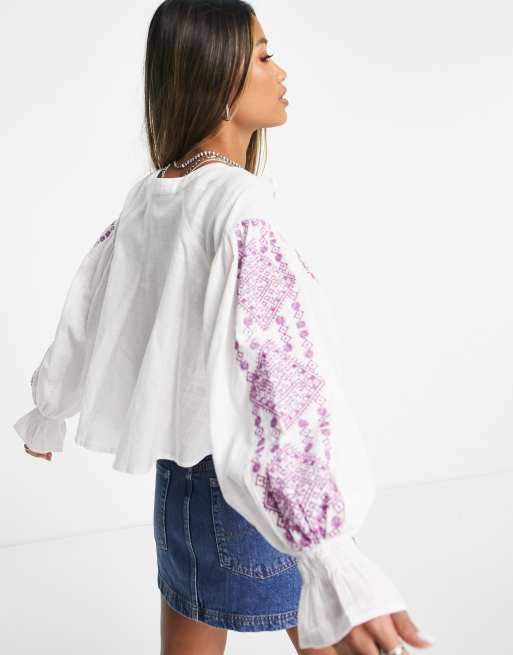 Reclaimed Vintage limited edition prarie blouse in white with contrast embroidery