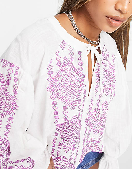 Reclaimed Vintage – Limited Edition – Prärie-Bluse in Weiß mit farblich  abgesetzter Stickerei | ASOS