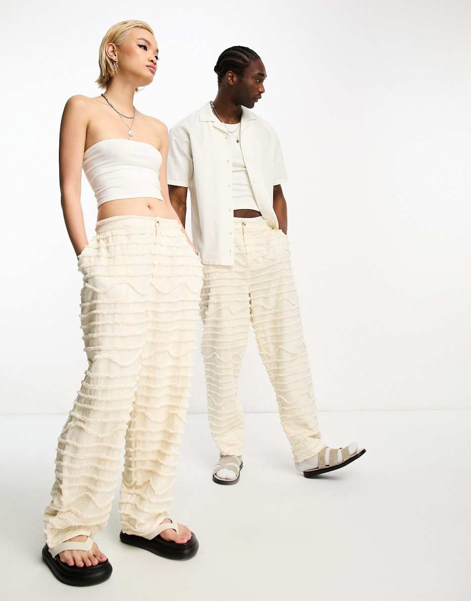 Reclaimed Vintage limited edition unisex loose wide fit distressed trousers in ecru
