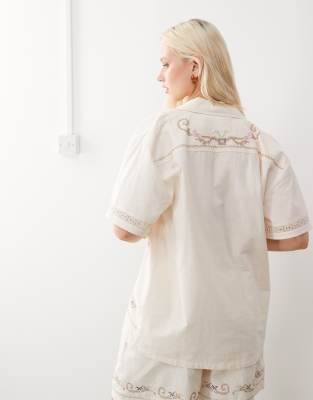 RECLAIMED VINTAGE LIMITED EDITION UNISEX SHORT SLEEVE RESORT SHIRT WITH FLORAL EMBROIDERY