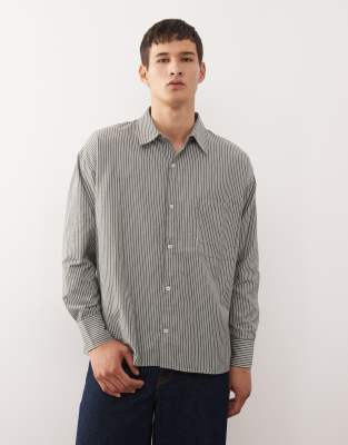 Reclaimed Vintage long sleeve boxy shirt in khaki green pinstripes