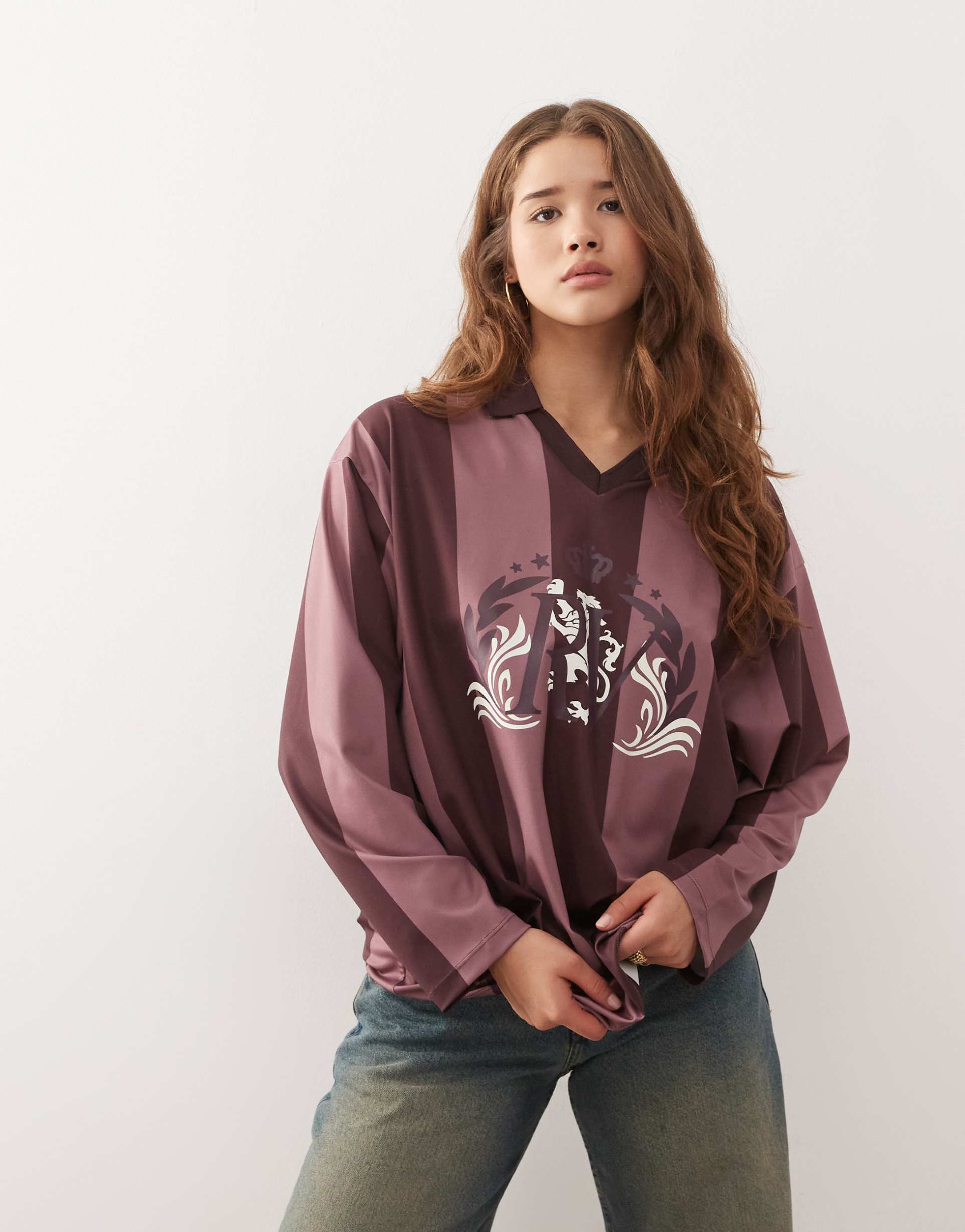 reclaimed vintage long sleeve soccer top in pink and purple stripes