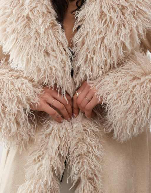 Reclaimed Vintage longline coat in off white with fur trims | ASOS