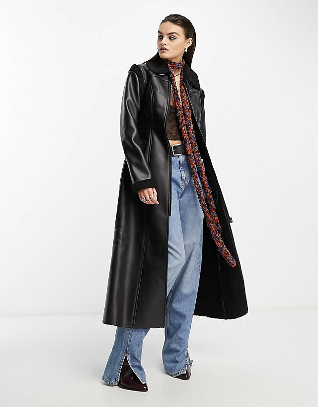 Reclaimed Vintage - longline faux leather trench coat in black with shearling trims