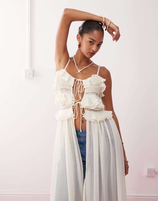 Reclaimed Vintage longline festival top with ruffles and tie front detail in cream