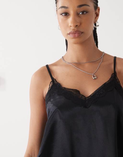 Reclaimed Vintage longline layering cami top with asymmetric hem and lace trim in black