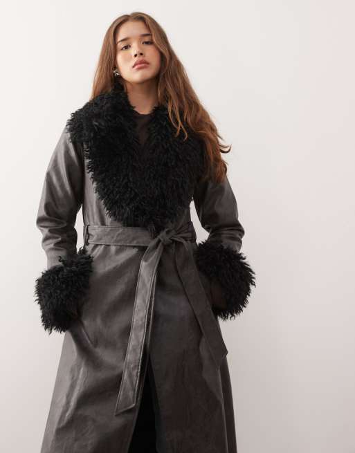 Reclaimed Vintage longline leather look trench coat with faux fur collar and cuffs in black