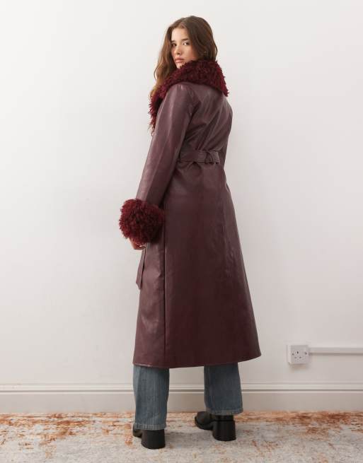 Reclaimed Vintage longline leather look trench coat with faux fur collar and cuffs in burgundy