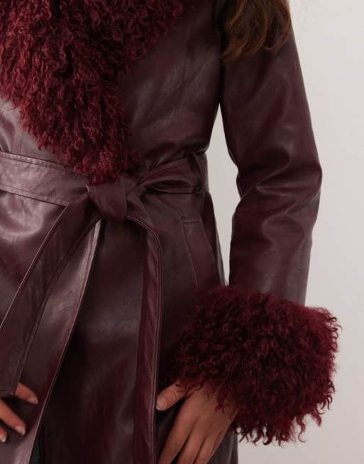 Reclaimed Vintage longline leather look trench coat with faux fur collar and cuffs in burgundy