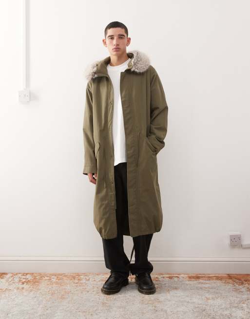 Reclaimed Vintage longline parka jacket with faux fur hood and drawstring waist in green 