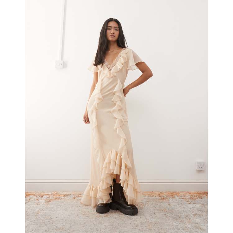 Reclaimed Vintage maxi day dress with ruffles and asymmetric hem in cream |  ASOS