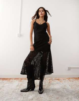 maxi dress with spliced lace panels in black