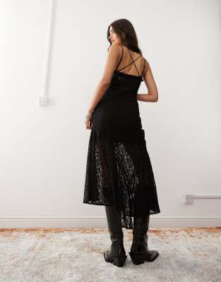 Reclaimed Vintage maxi dress with spliced lace panels in black | ASOS