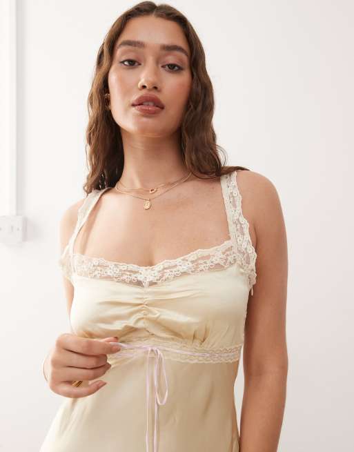 Reclaimed Vintage maxi slip dress with contrast pink trim in cream