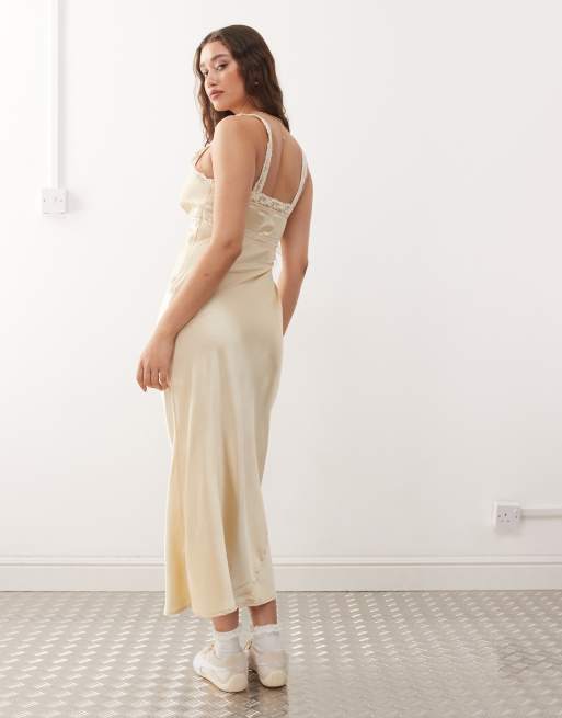 Reclaimed Vintage maxi slip dress with contrast pink trim in cream