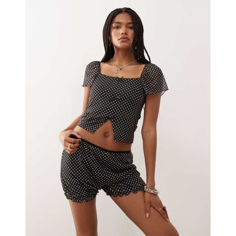 Reclaimed Vintage mesh micro bloomer shorts in black polka dots